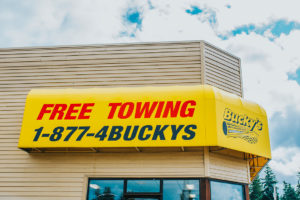 Bucky's Auto Repair Federal Way colorful signage with free towing