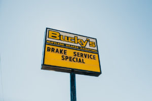 Bucky's Tacoma Narrows Auto repair location billboard