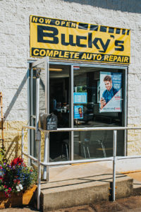 Bucky's silverdale auto repair with a colorful sign