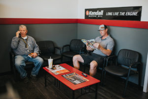 Men sitting at Bucky's lynnwood auto repair location lobby