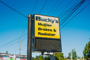 Electronic billboard for car repair at the lynnwood Bucky's Muffler Brakes & Radiator